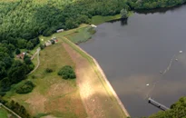 Bank Fishing Along The Dam