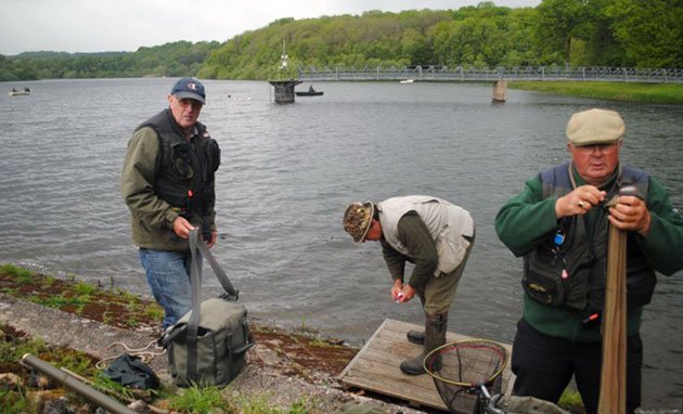 'The Wood Butcher', the Bailiff and 'The Fishmonger' packing up